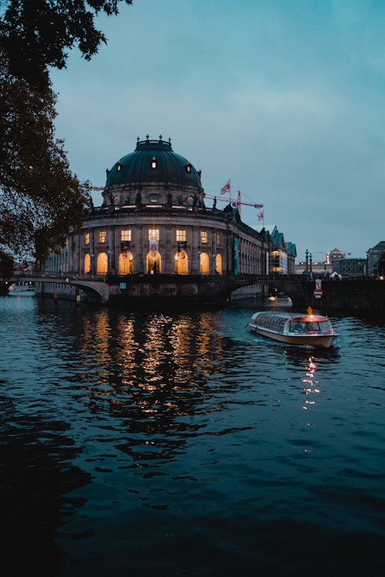white boat on calm body of water in Bode Museum Germany