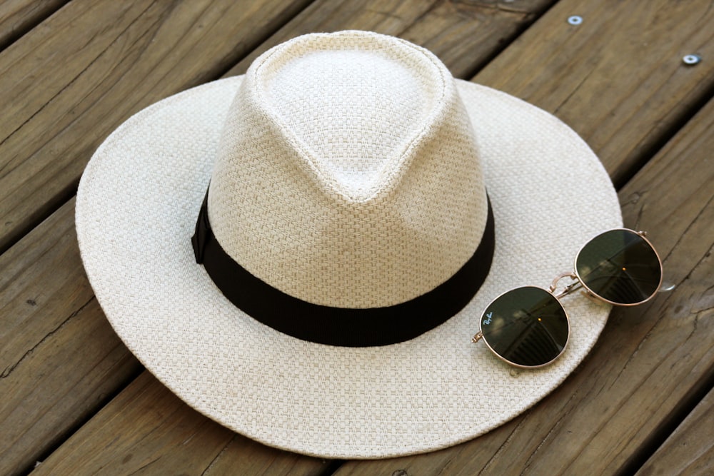 beige and black hat