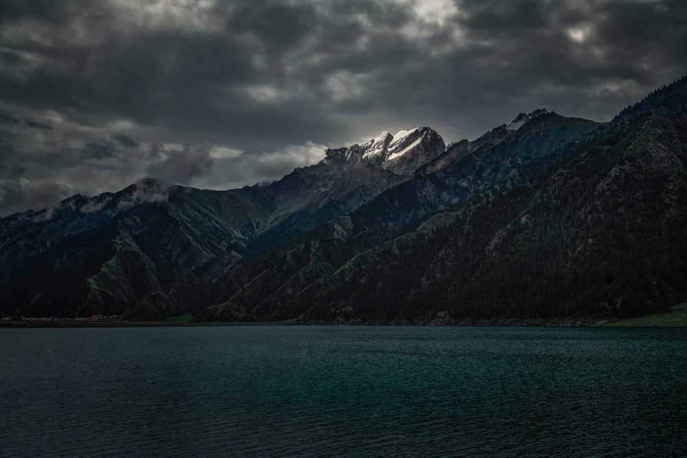 lake beside hills