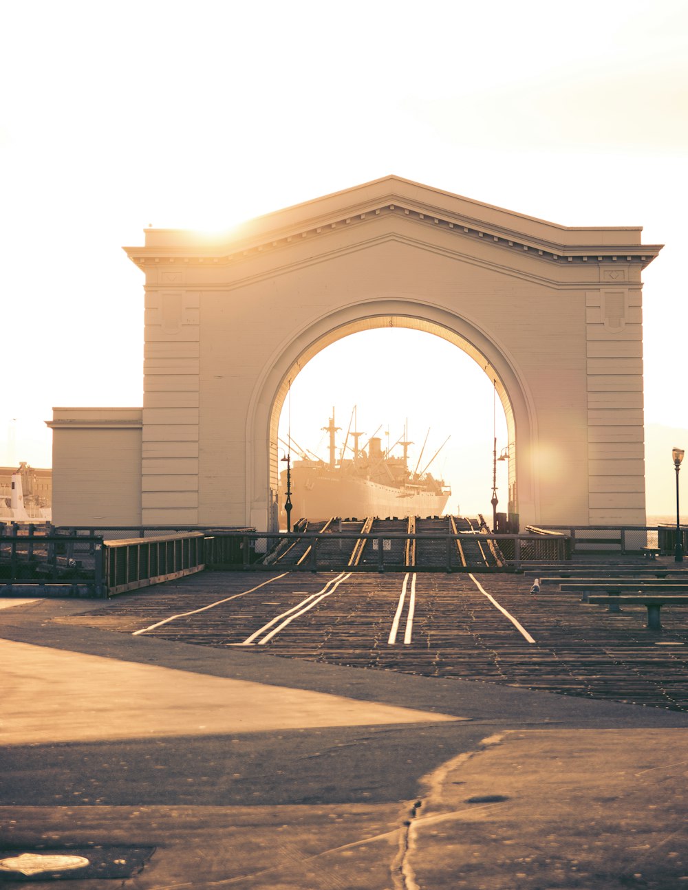 architectural photography of white concrete arch