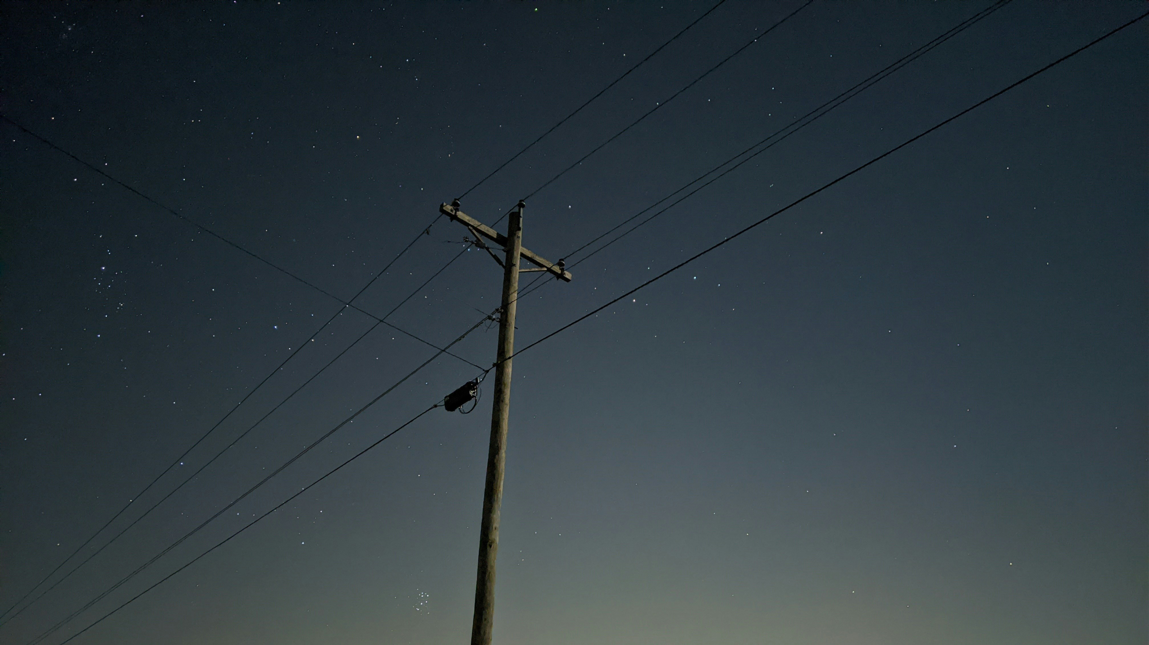 silhouette of electric post
