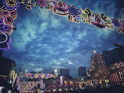 Colorful festival decorations lighting up Bareilly’s main square at night.