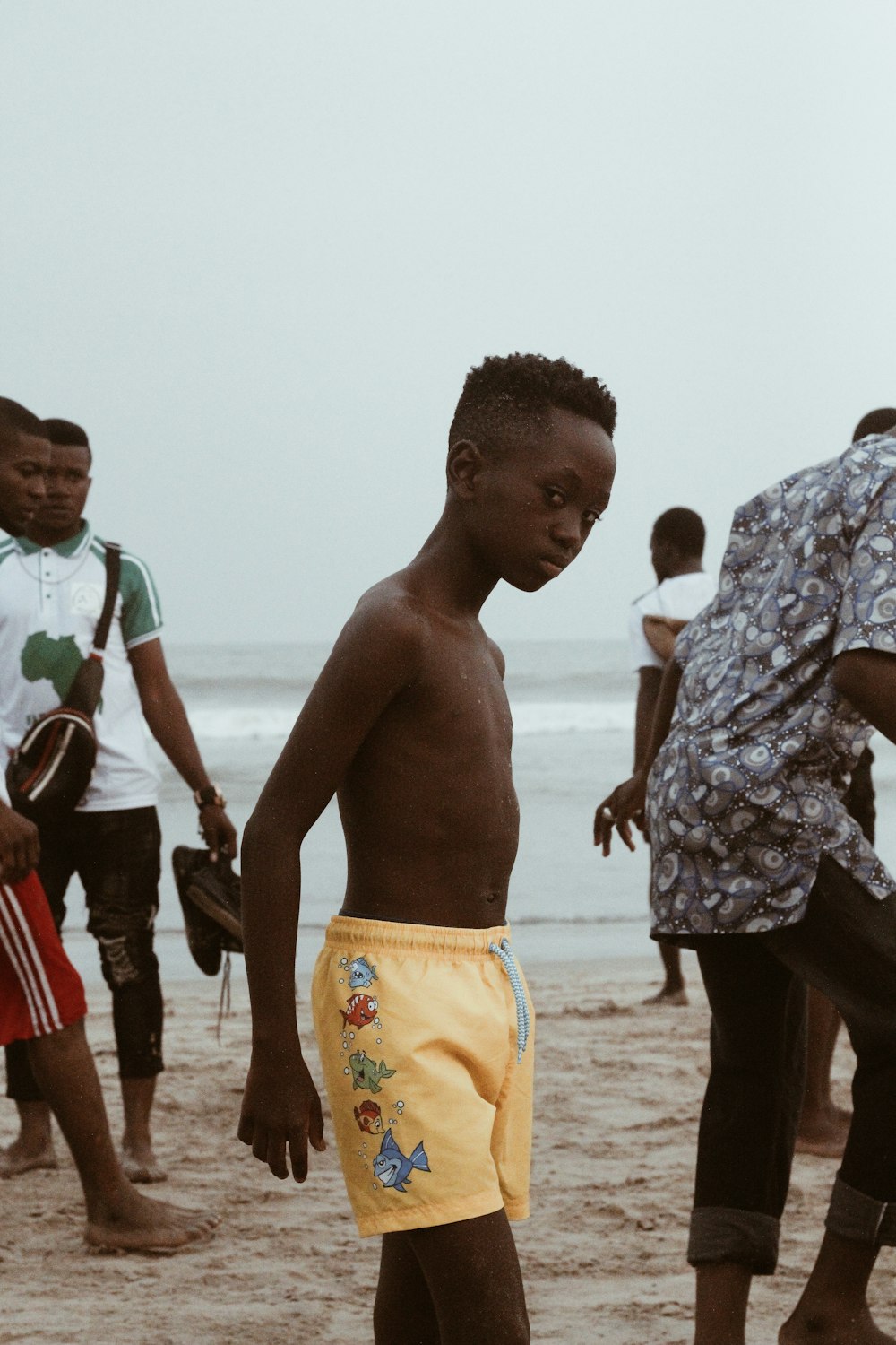 topless boy at beach