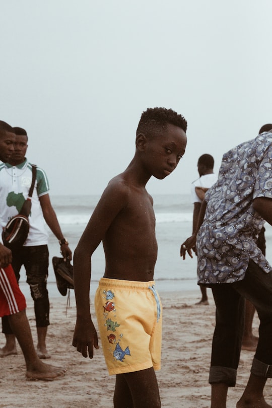 topless boy at beach in Labadi Beach Ghana