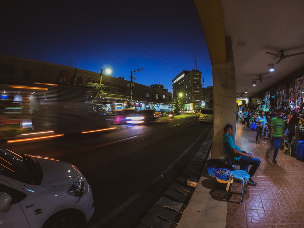 people near road at night