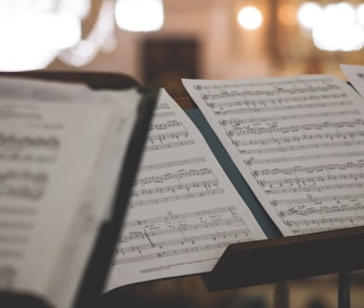 closeup photo of printer paper with musical notes
