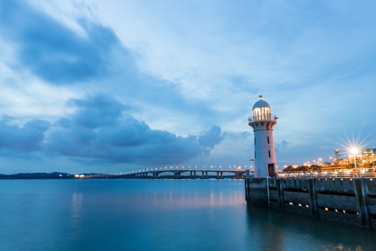 lighthouse during nighttime in Tuas Link MRT Station Singapore