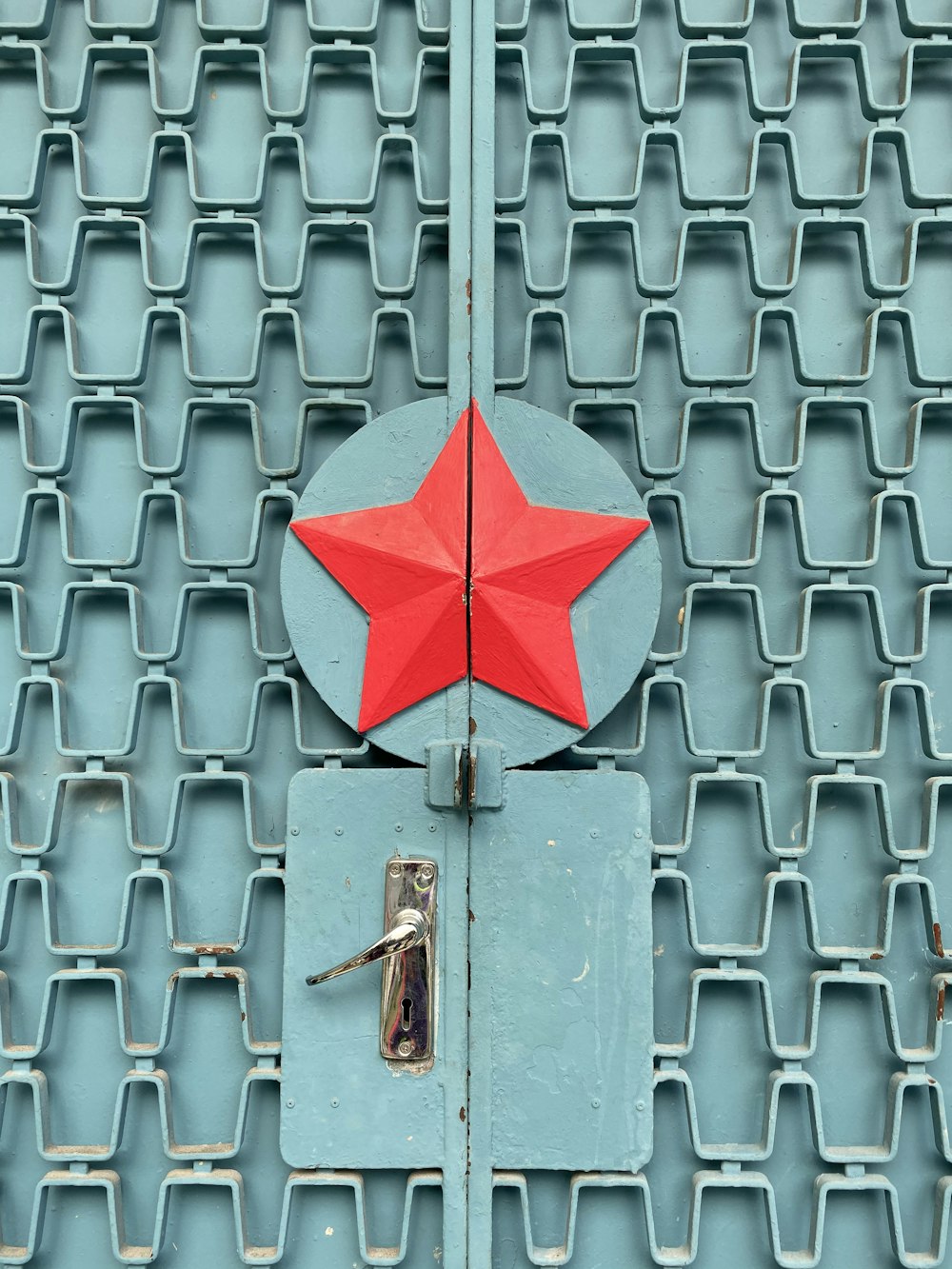 closeup blue metal gate