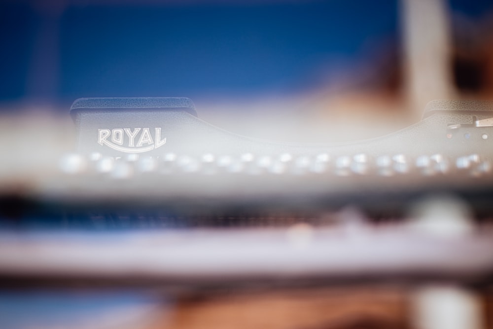 a close up of a keyboard with the word royal on it