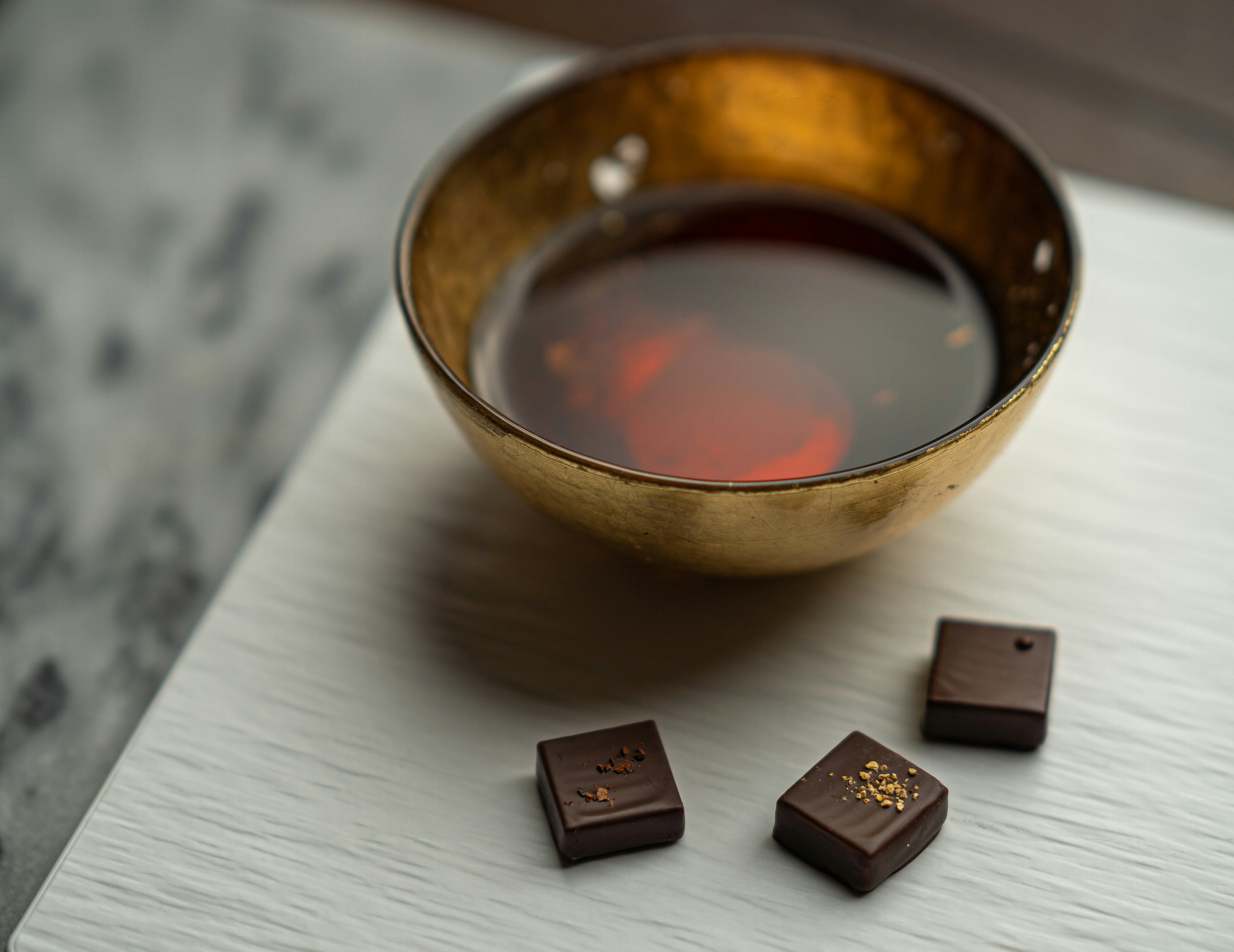 brown tea cup on table