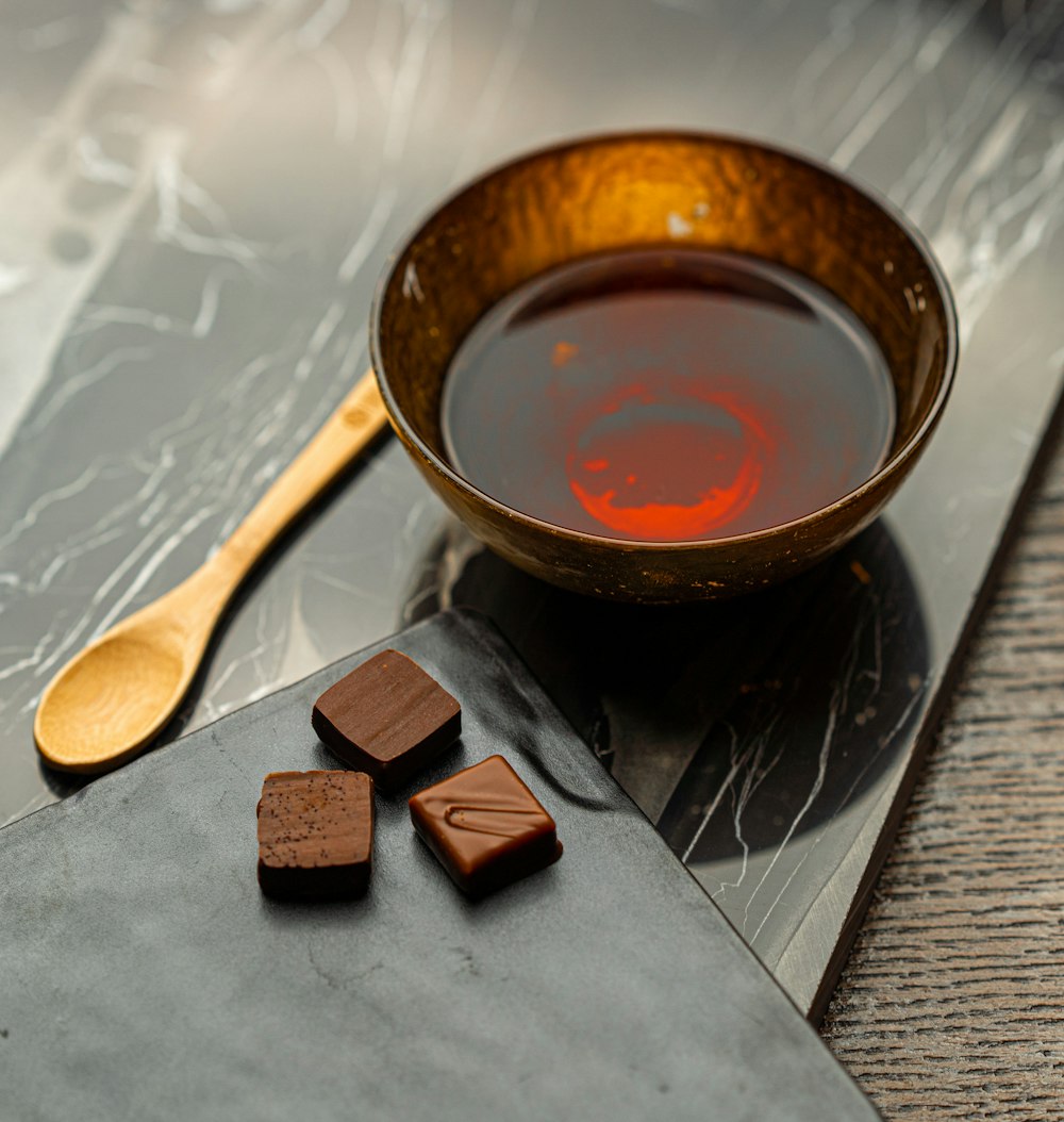 brown bowl with spoon