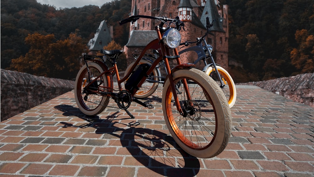 two black motorized bicycles