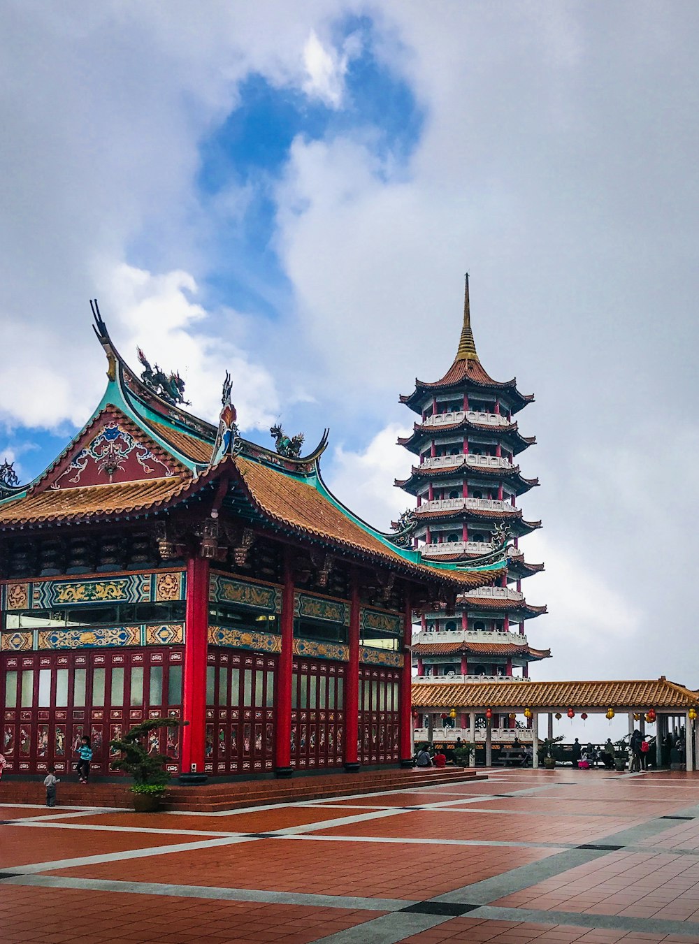 architectural photography of red, brown, and blue temple