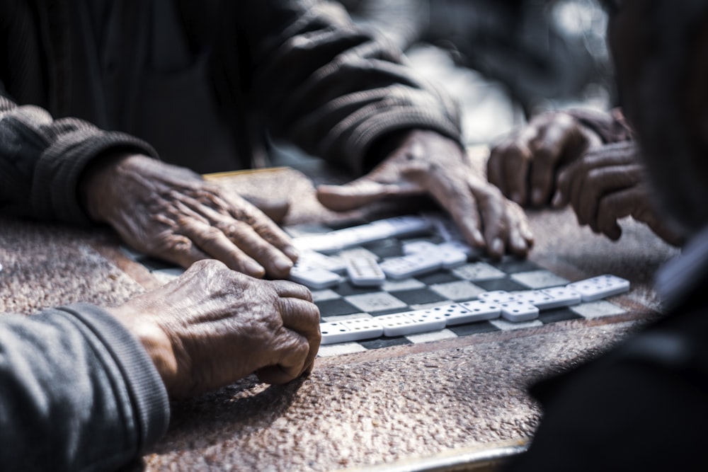 person playing dominos