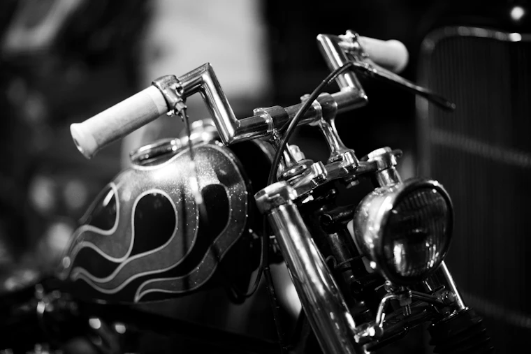 A black motorcycle in grayscale