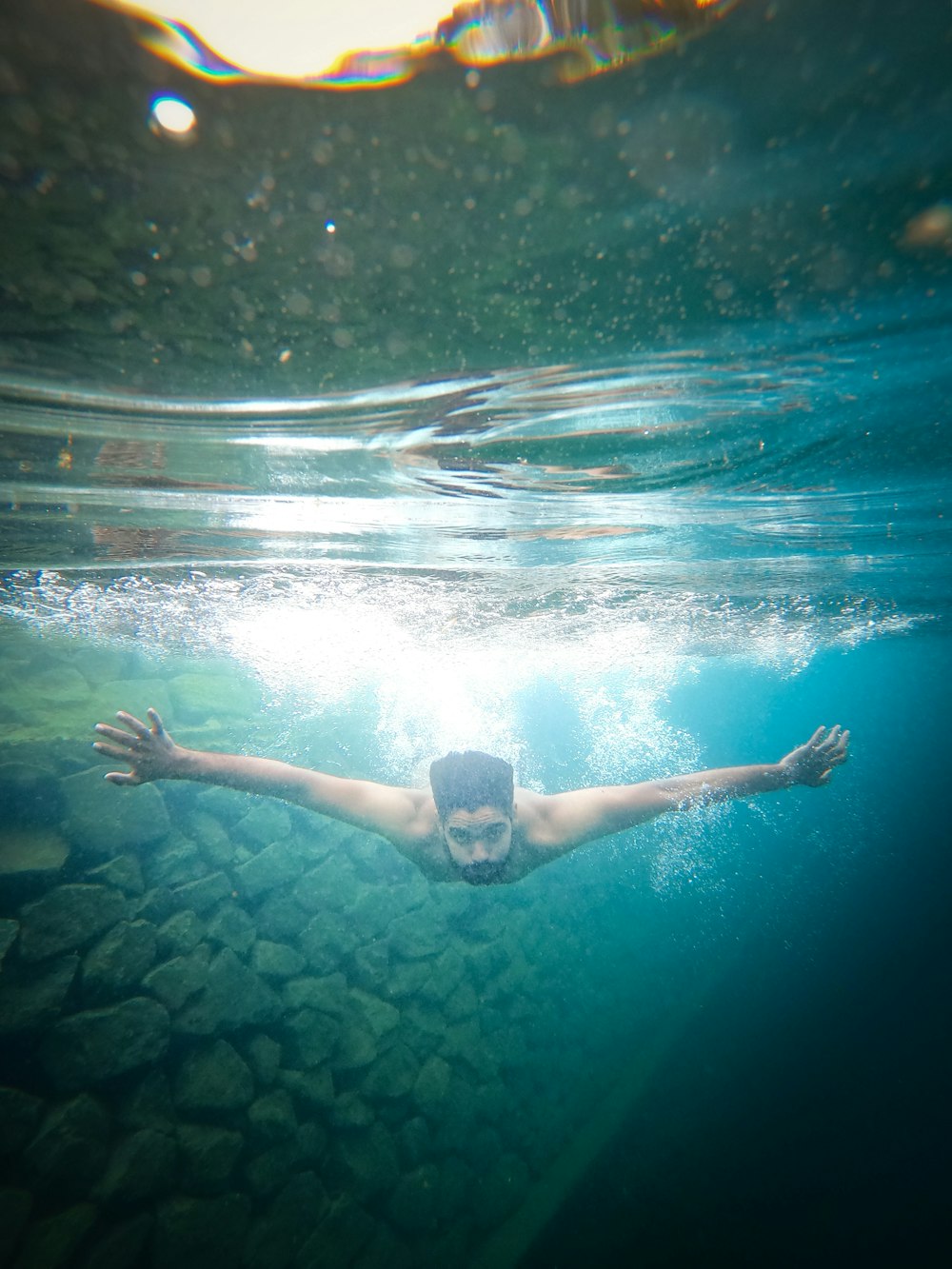 topless man diving