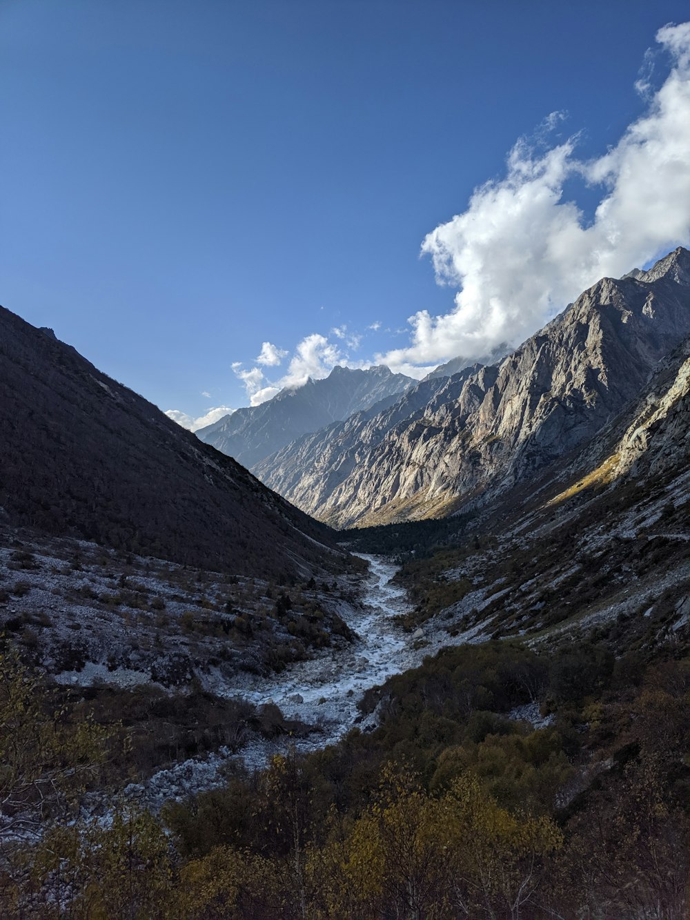 mountains under cloudy sky