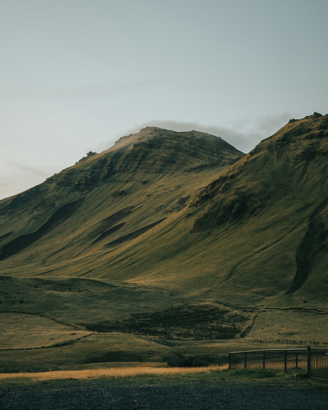 mountains under white sky