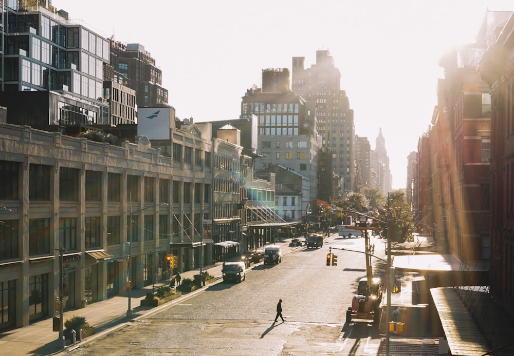 gray building and a city road landscape at sunrise