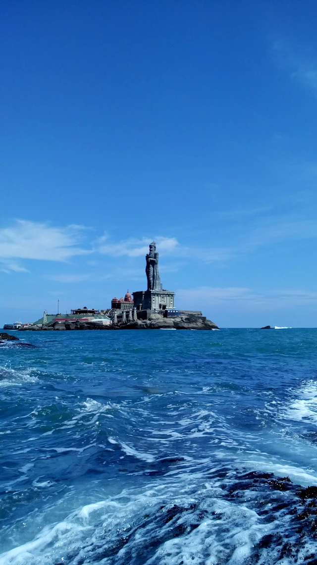 The memorial rock and statue off the coast at Kanyakumari, Tamil Nadu
