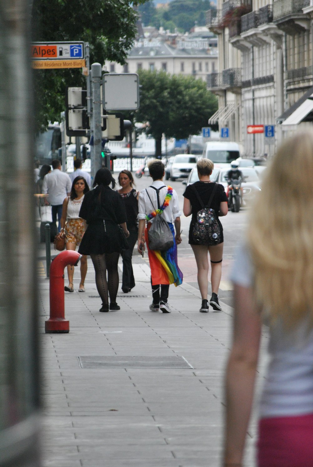 people walking on sidewalk