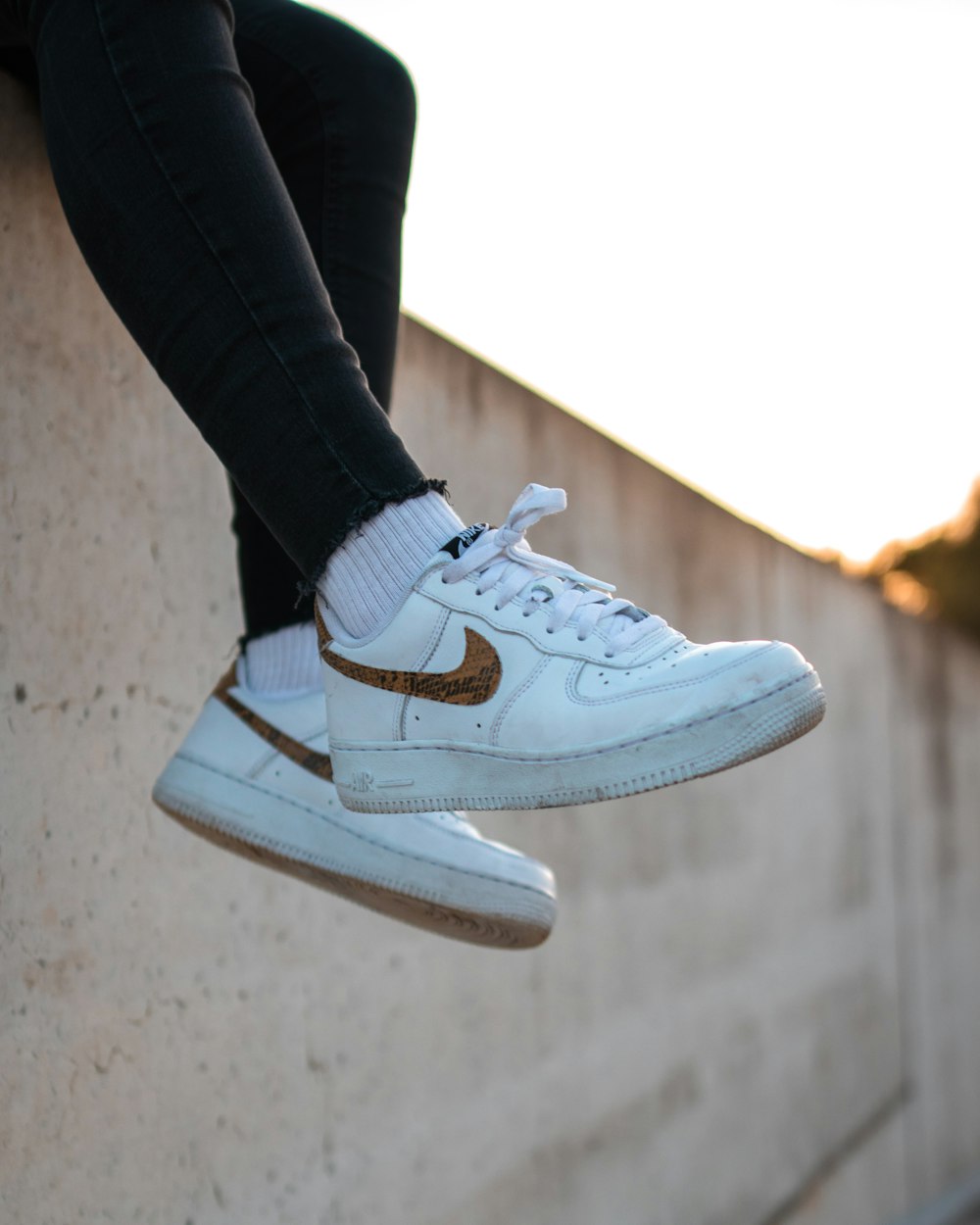 white Nike low-top sneakers