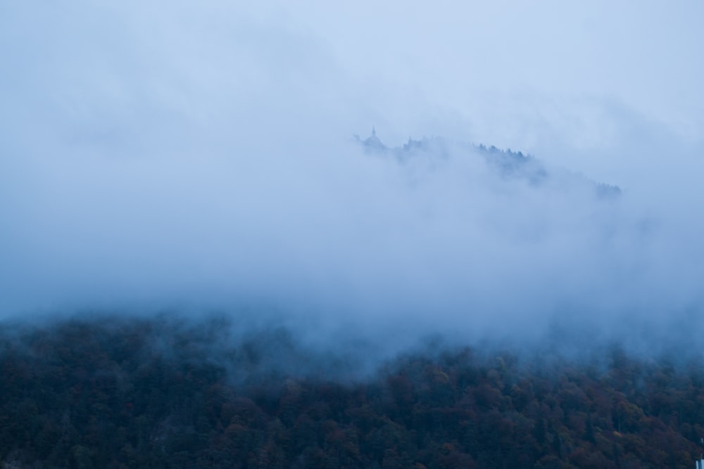 mountain with white smoke