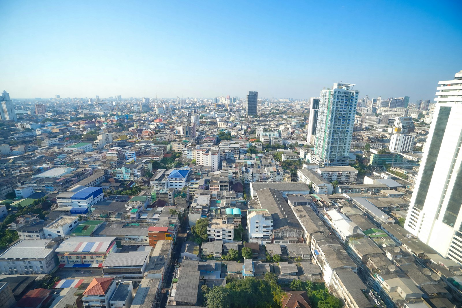 Aerial view of Bangkok city with high-rise buildings