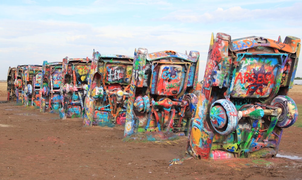 cars on ground with paints