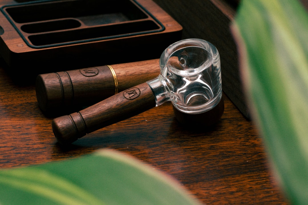 brown and clear smoking pipe