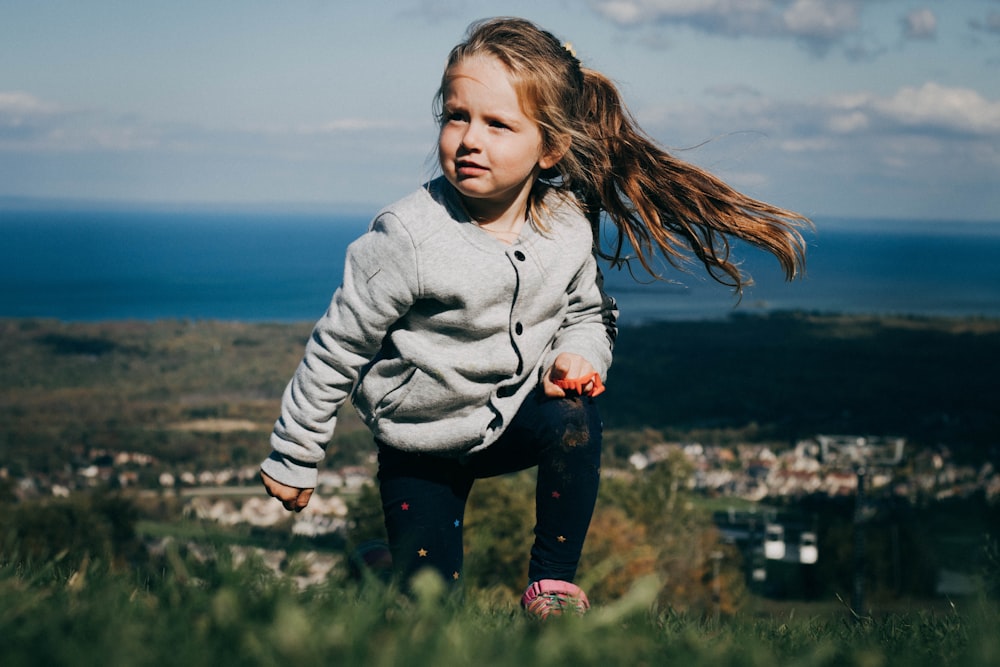 girl climbing on mountain