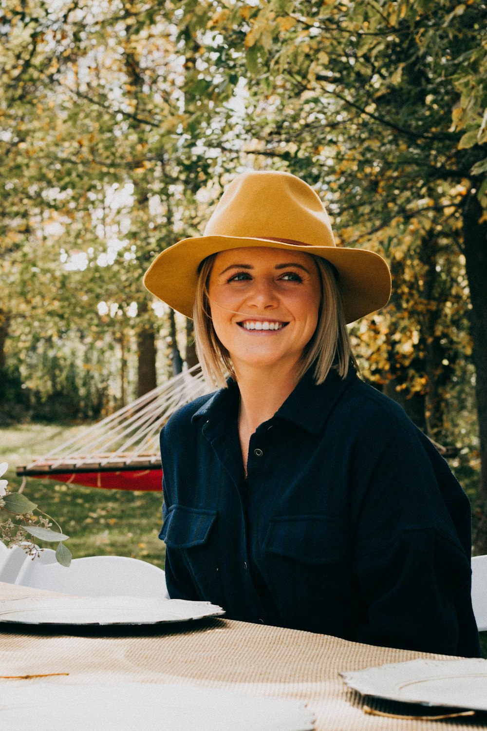 woman sitting infront of table