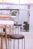two brown bar stools