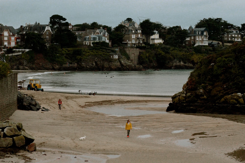 person walking on brown filed