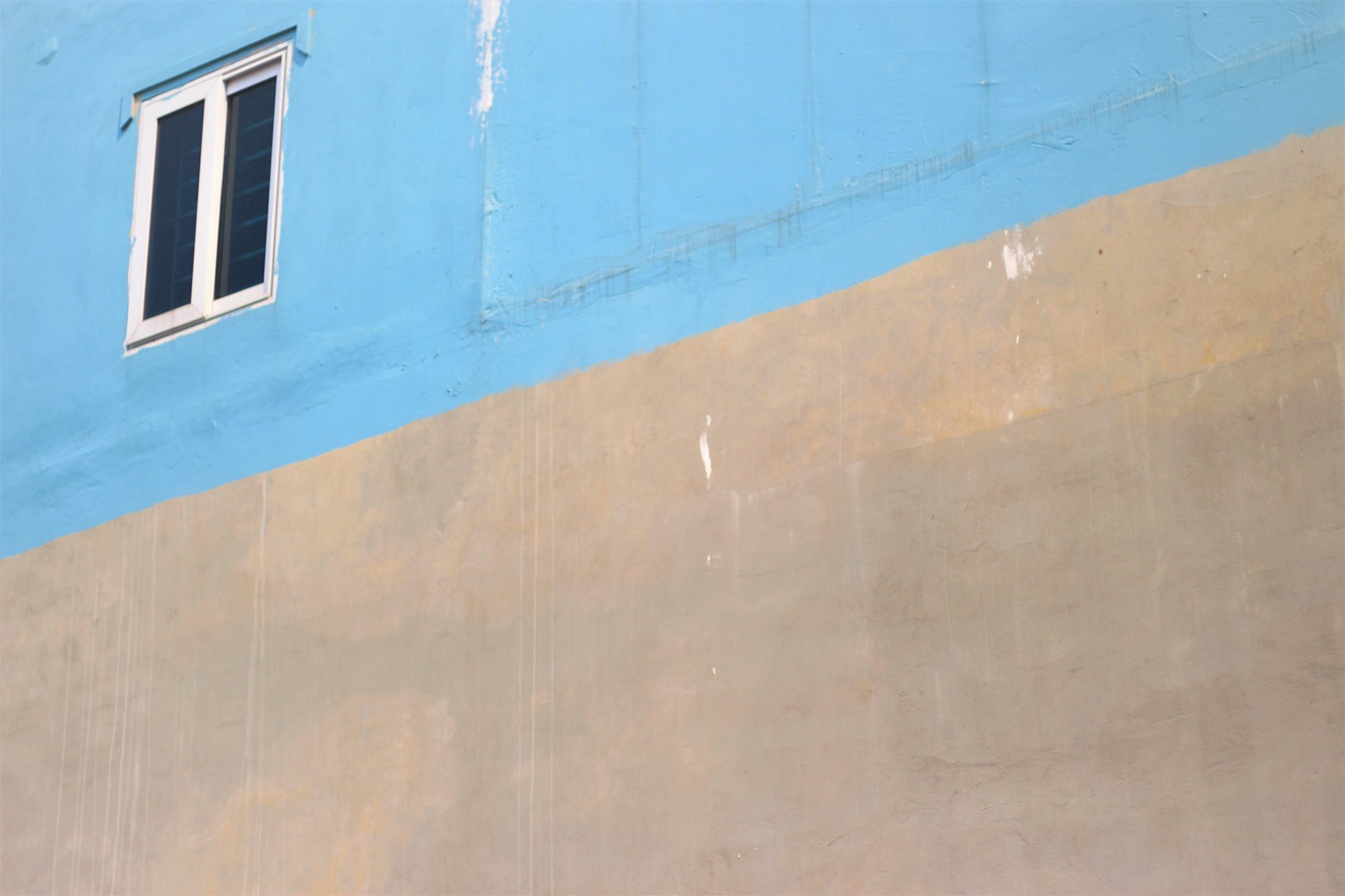 brown and blue concrete building