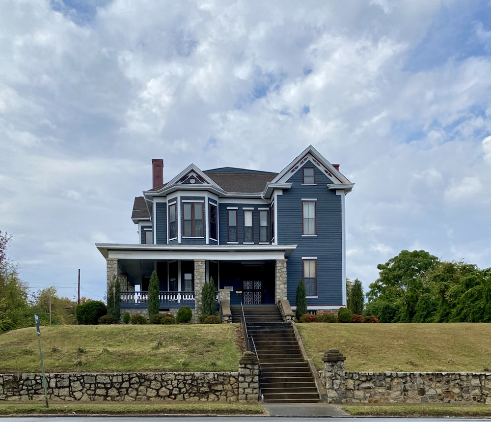 architectural photography of gray and blue house