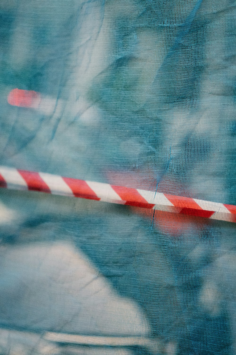 yellow and red striped stick