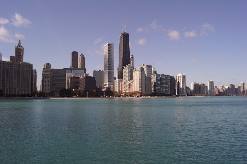 buildings beside body of water