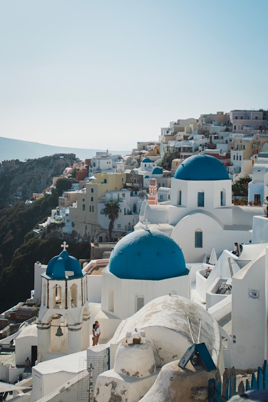 white and blue concrete building in Thíra Greece