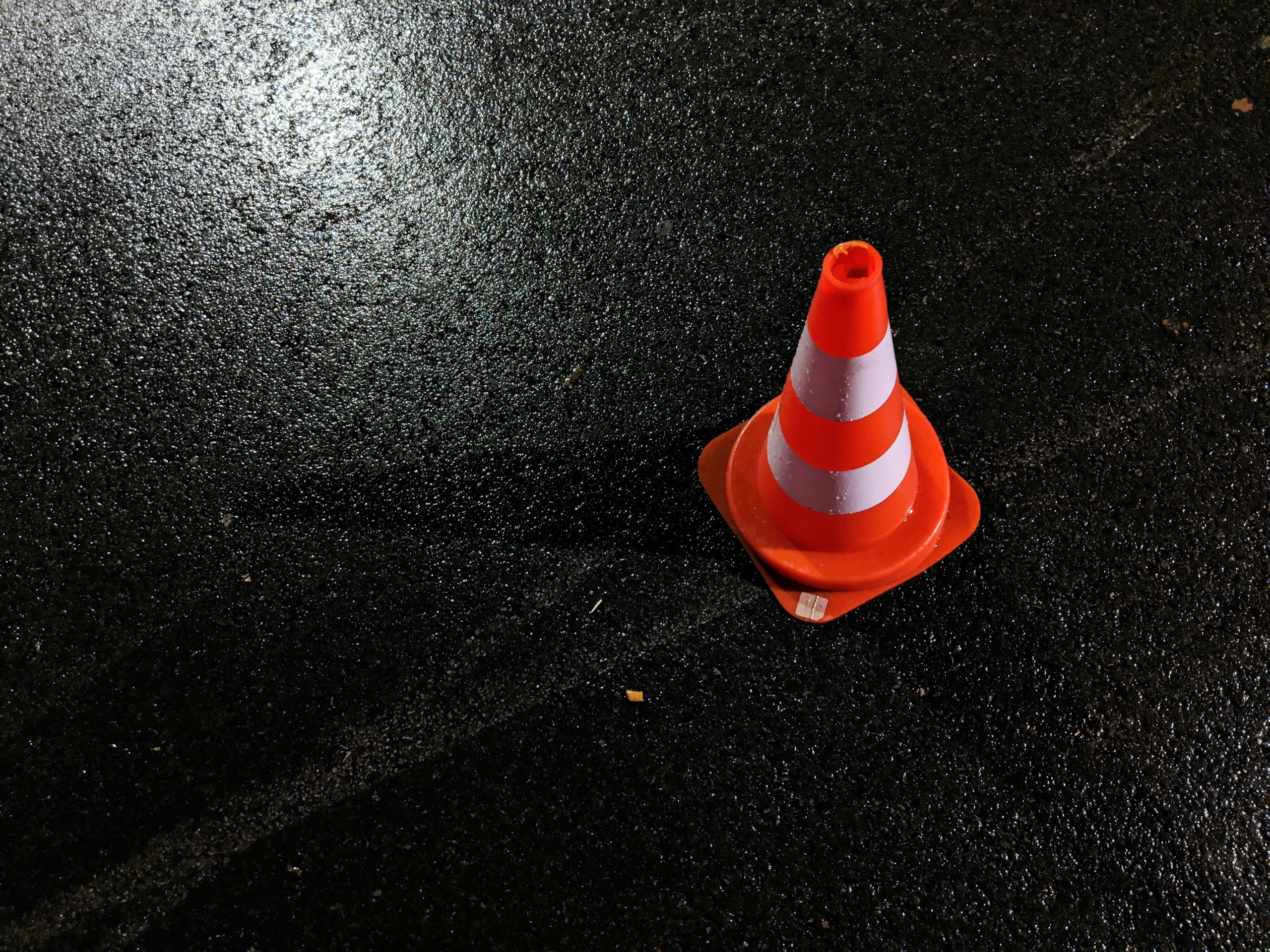 orange and white traffic cone