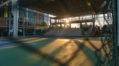 Evening lighting inside the tennis center creating a warm and inviting atmosphere.
