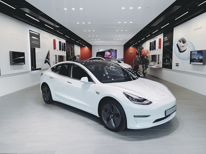 white sedan photograph