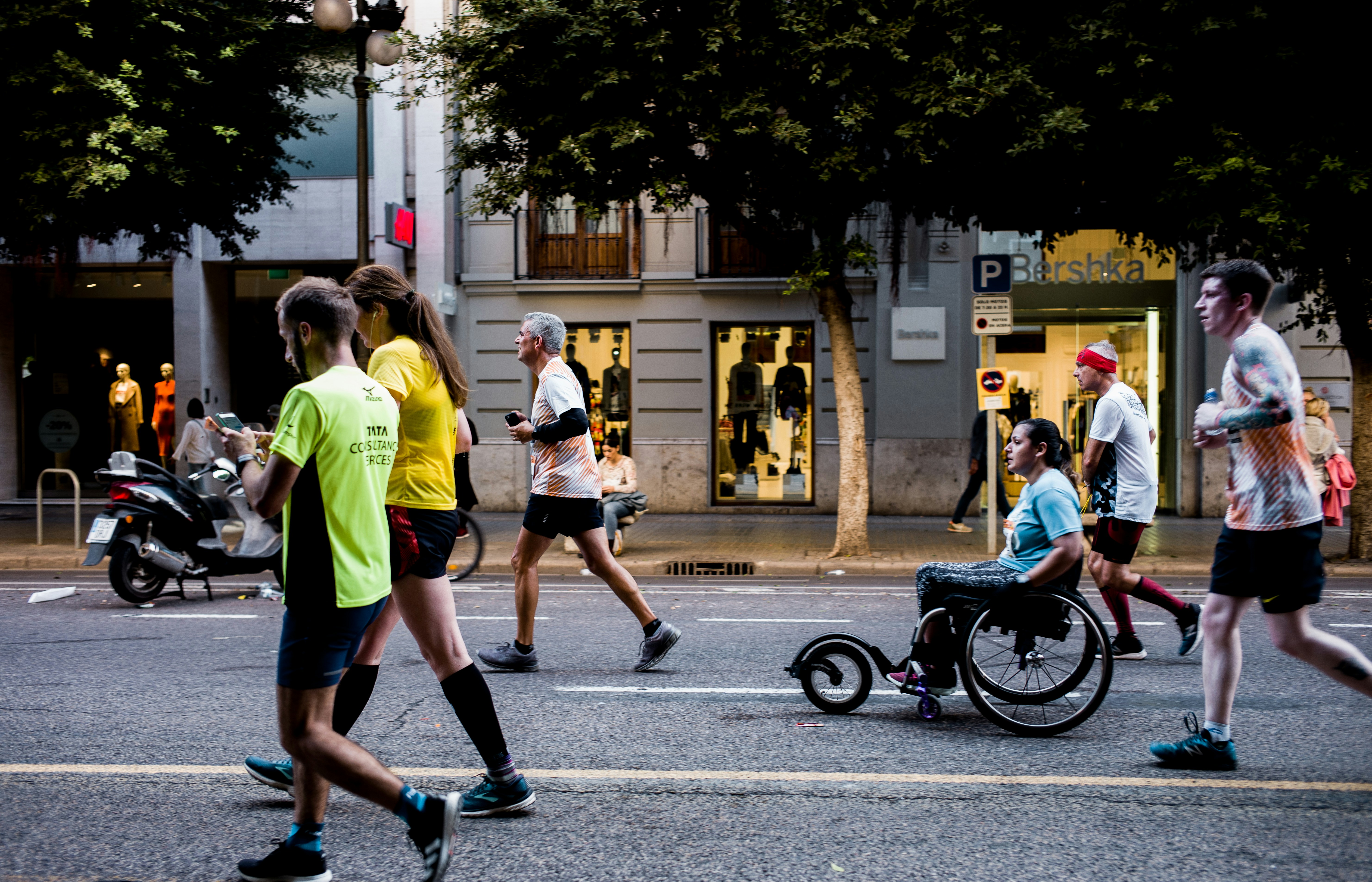 people running on road