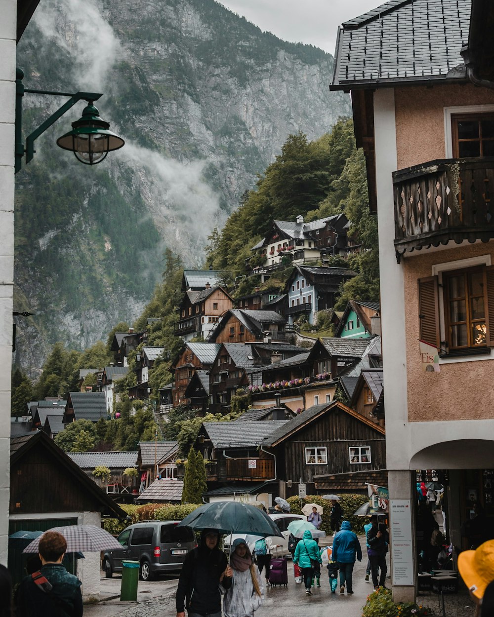 people near houses