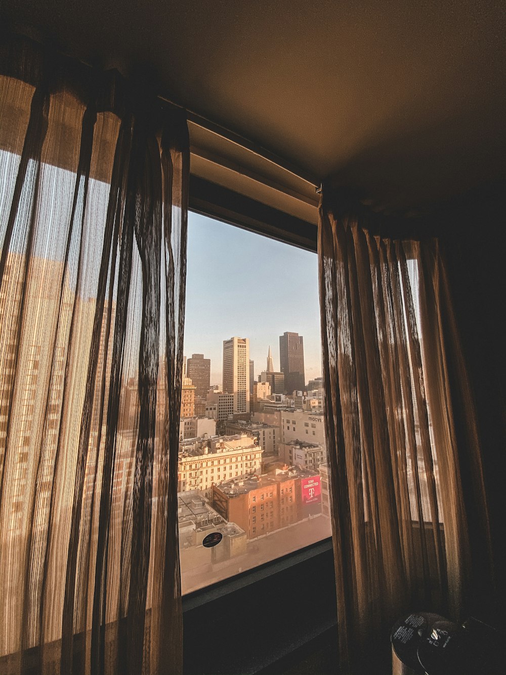 cityscape through wind with curtains