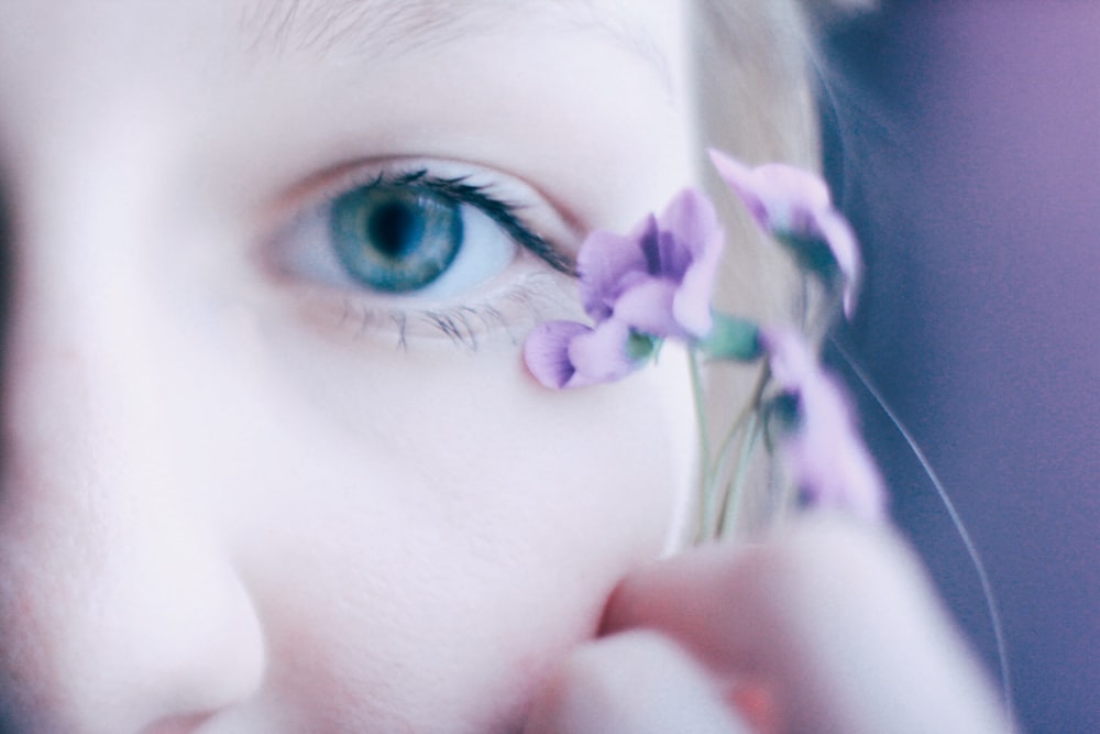 girl holding flower