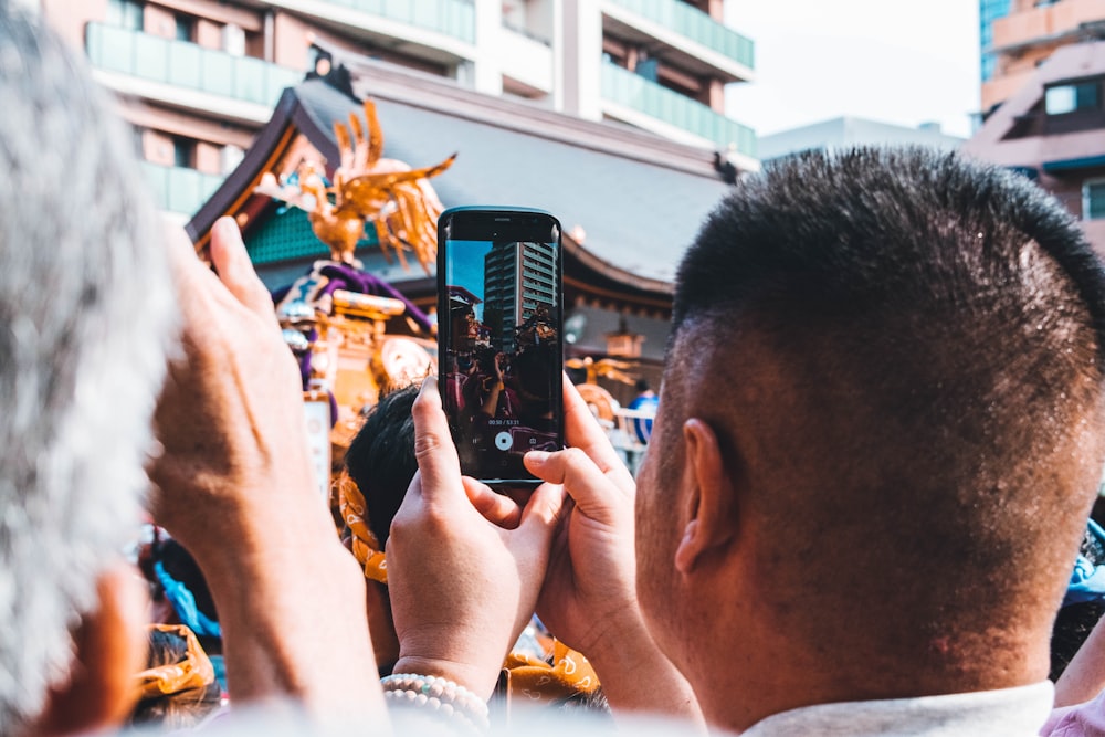 man taking photo