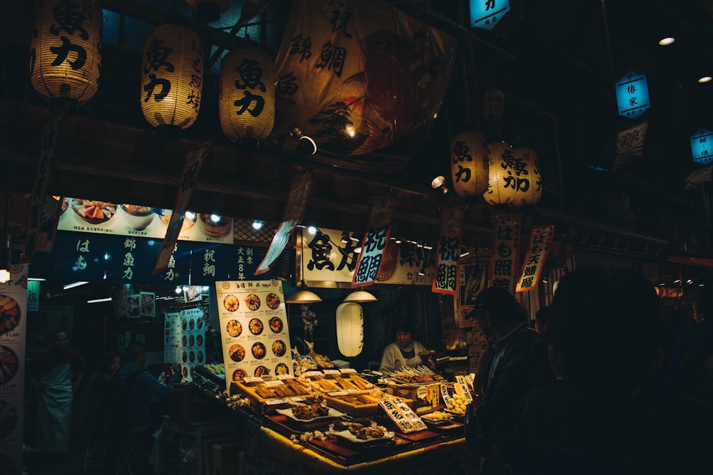 man standing infront of vendor