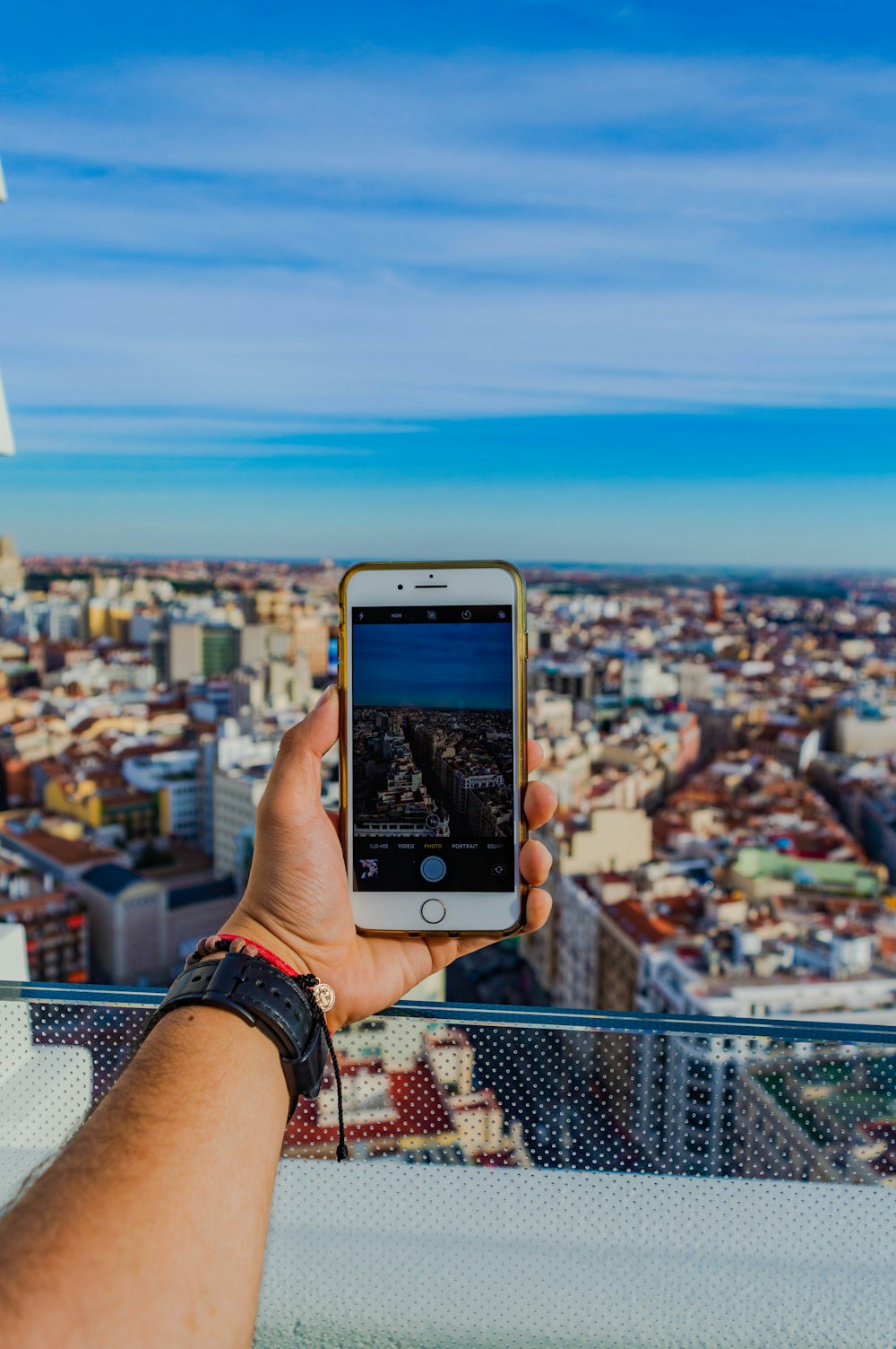 shallow focus photo of person holding silver iPhone 6