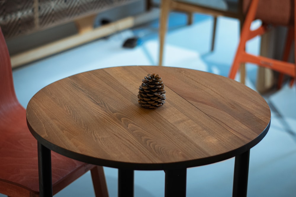 brown pine cone on table